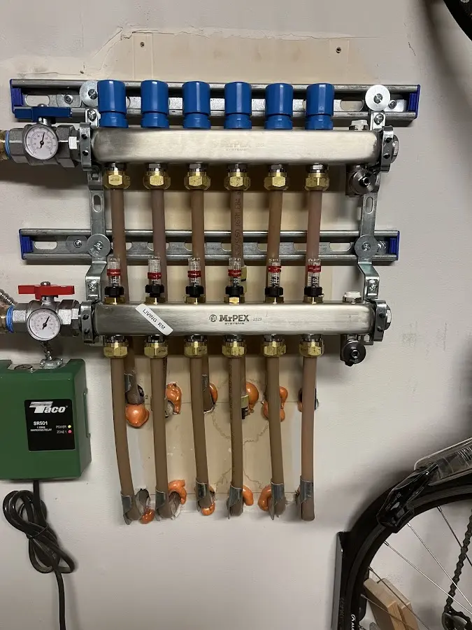 Plumber performing Water Heater Repair at a residential property in Highlands